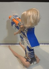 Doll on Blue and Silver Plastic Toy Space Gun. Sid Aardpiggy’s Halloween Story!