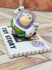 2 MINISO Disney 100 Years of Wonder Retro Stamp Series Monsters Uni & Toy Story