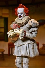 NECA Official – IT: Welcome to Derry – Ultimate Bob Gray as Pennywise 7″ Scale A
