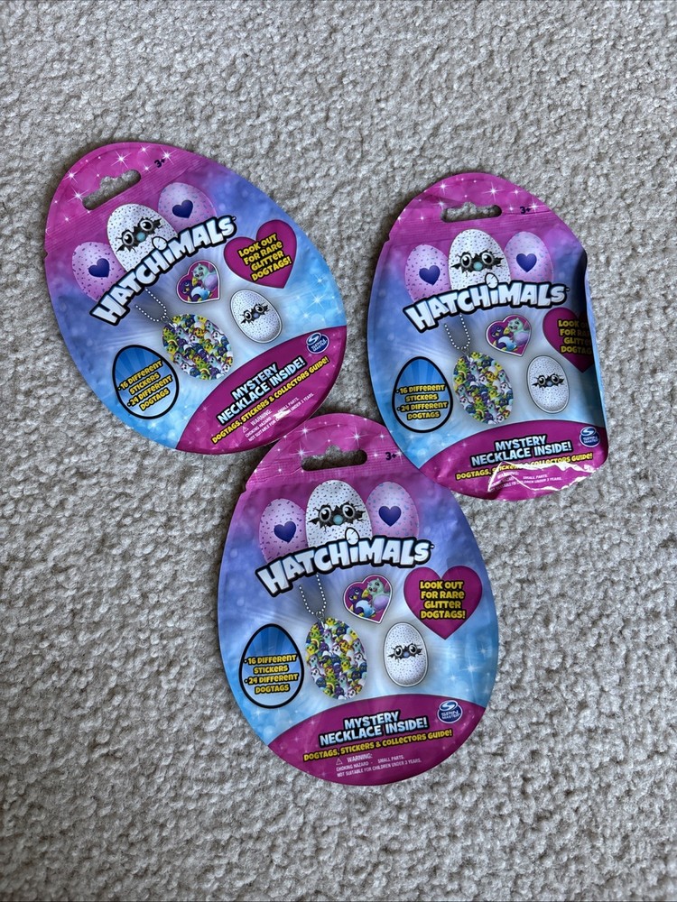 HATCHIMALS Mystery Necklace Dogtag Sticker Pack – 3 Unopened Packs Bulls i Toy