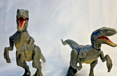Set Of 2 Jurassic World Velociraptor Gray and Blue Dinosaur Mattel