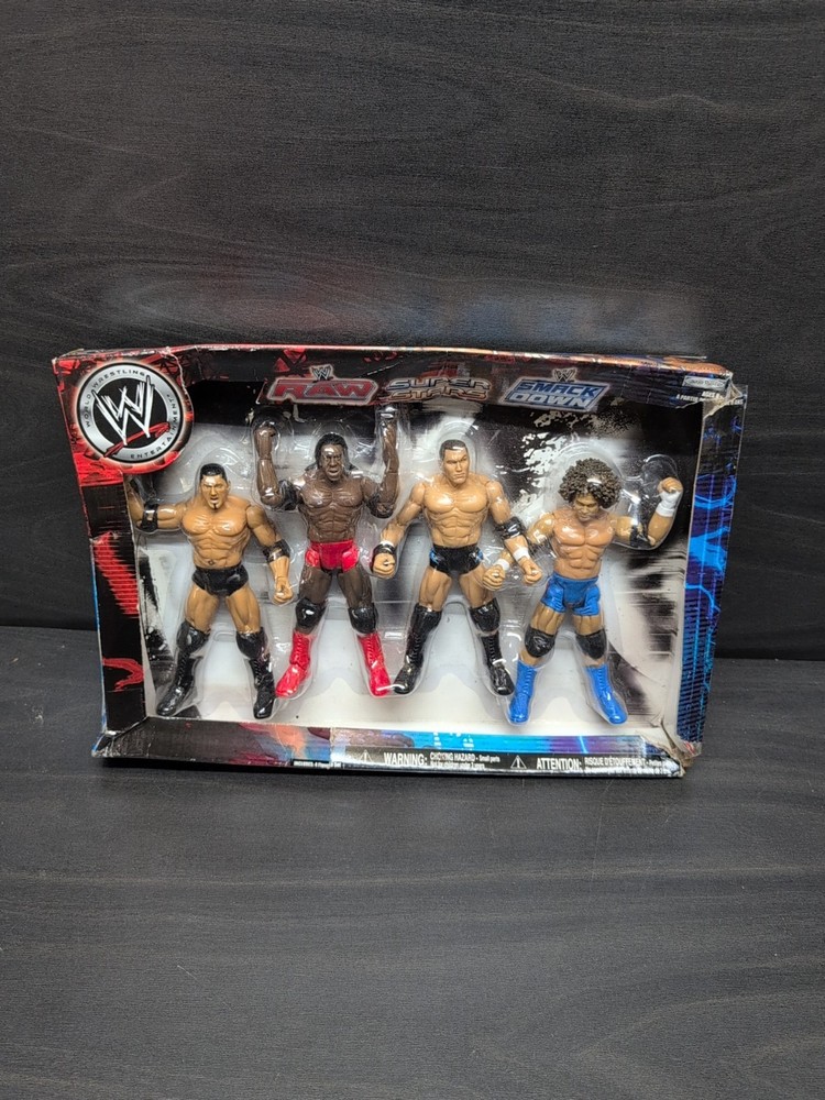Jakks WWE Superstars RAW SMACKDOWN NEW 4 Figure Set Batista Orton Booker Carlito