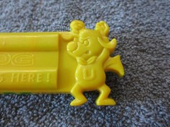 1975 Plastic Green/Yellow Toy Harmonica Have No Fear Underdog Is Here Lednardo