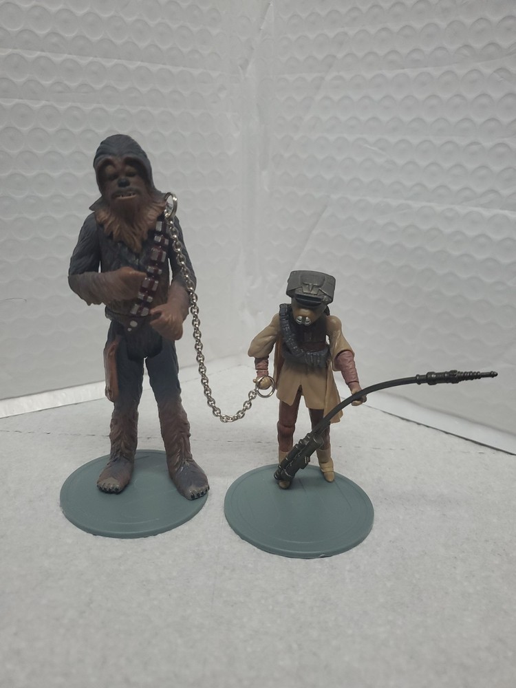 Star Wars Chewbacca Prisoner & Princess Leia Boushh The SAGA Collection 2006
