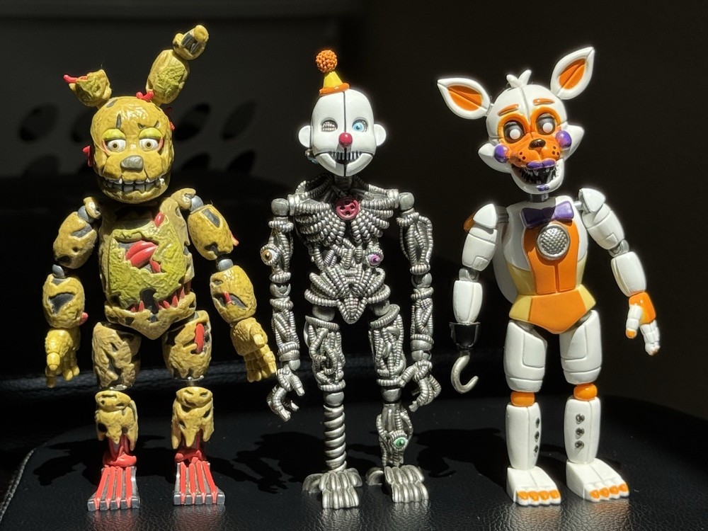 Funko 2016 & 2017 Three 5’ inch Figure Set: Springrap, Ennard, and Lolbit.