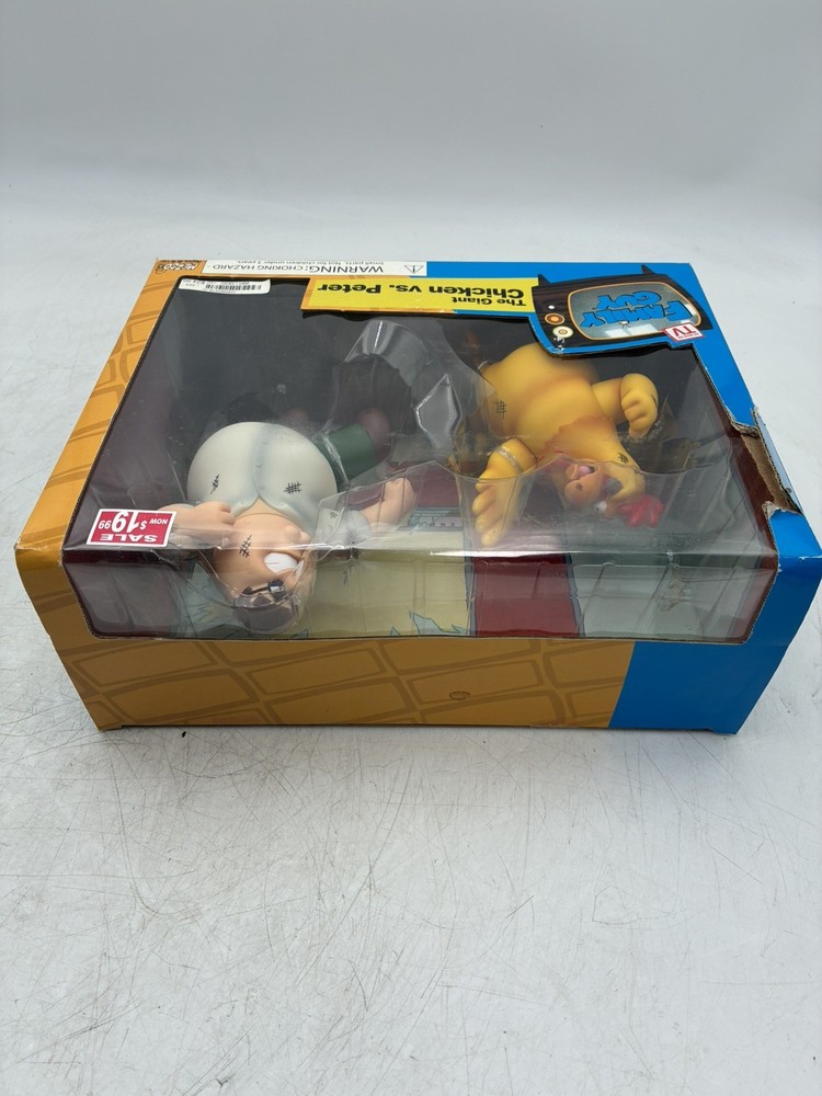 Mezco Family Guy the Giant Chicken vs Peter Figure Set Sealed. Box is damaged.