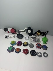 Beyblade Lot – Beyblades, Parts, and Launchers – See Photos & Read Desc