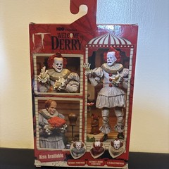 NECA Ultimate Bob Gray as Pennywise The Dancing Clown Welcome To Derry In Hand