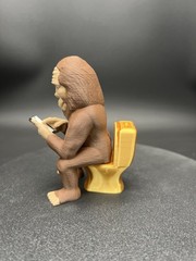 Sasquatch Bigfoot Figurine Scrolling And On A Golden Throne!