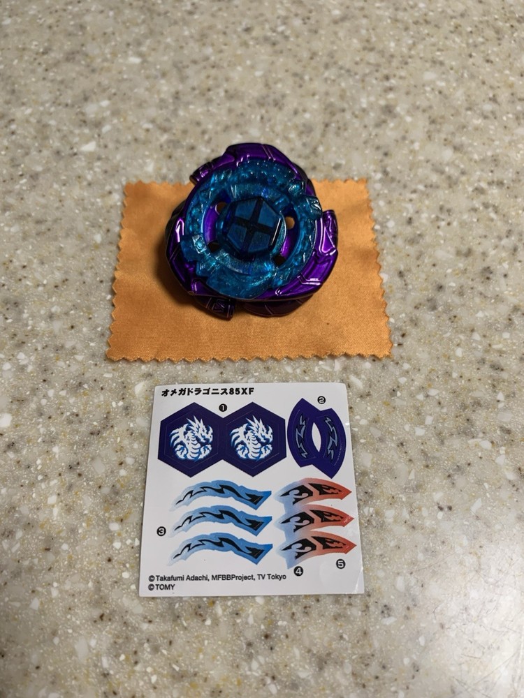 Takara TOMY Omega Dragonis 85XF Metal Fight Beyblade with Guide Book