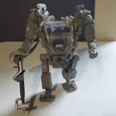 McFarlane Toys Avatar Quaritch Amp Suit Action Figure 11.8 Inches with Weapons