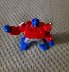 2 1/2″ Plastic Red Silver+Blue Optimus Prime Mini Transformer Action Figure Toy