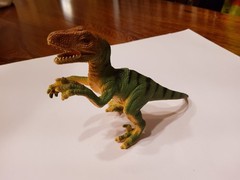 velociraptor action figure 5 1/2 inches. Made in china