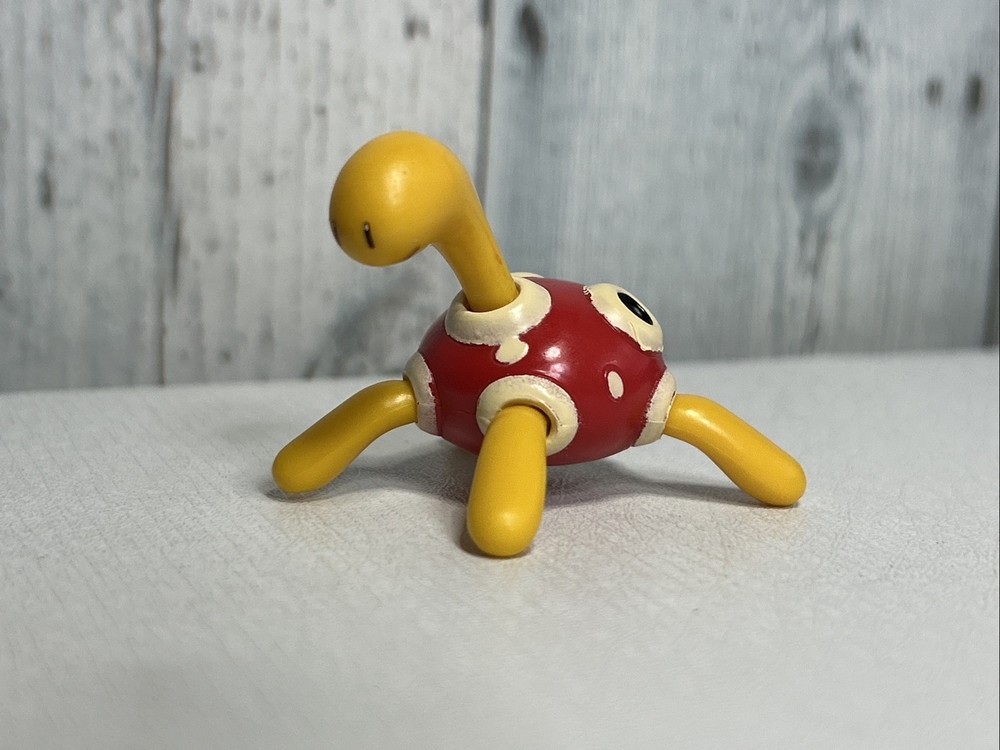 Pokemon Shuckle Figure Jazwares Nintendo Red Yellow Turtle Vinyl Figurine 2.25″
