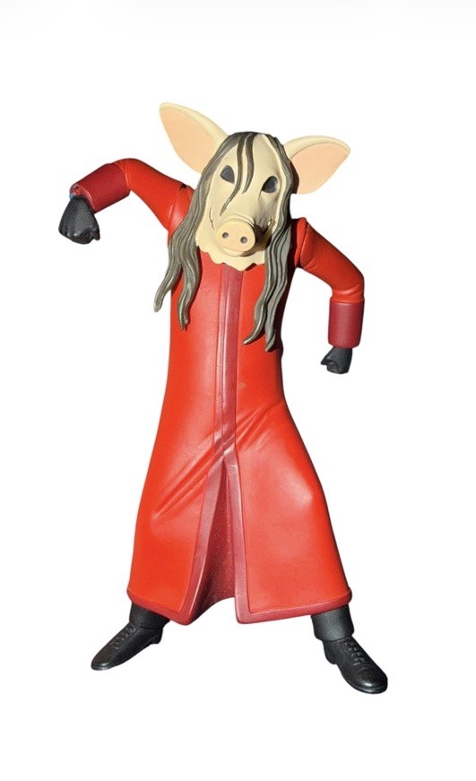 6-inch action figure Jigsaw Killer in a red robe from the Saw movie franchise.