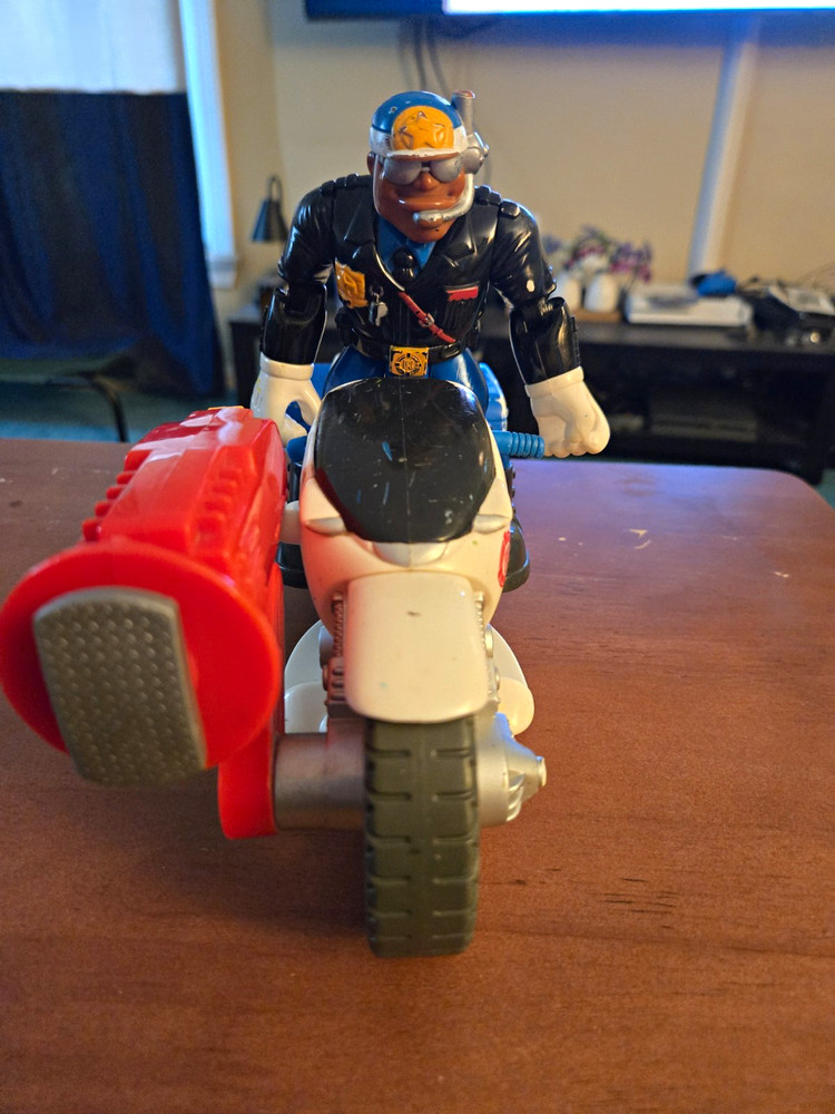 Galoob Plastic Action Figure w/ Motorcycle Vehicle, Multicolor