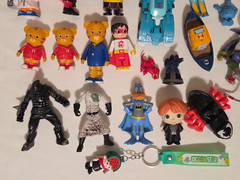 Assorted toys and figures. Iron Man, Venom, McDonald’s, Daffy Duck , TMNT & More