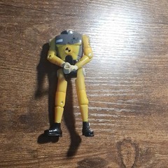 Yellow/Gray/Black Crash Test Dummy Articulated Action Figure – Plastic