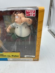 Mezco Family Guy the Giant Chicken vs Peter Figure Set Sealed. Box is damaged.