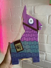 Fortnite 4″ Supply Llama – Potassius Peels Peely action figure with accessories.
