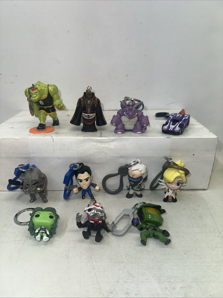 11 PVC Keychains Bookbag Hangers Ganon Zeld Pokemon Nidoking Space Jam Fall Out