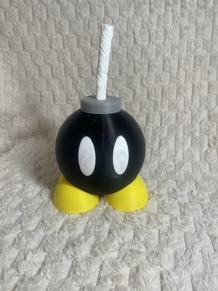 Super Mario Bros. Bob-omb Plastic Figurine Black Yellow White Gray
