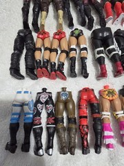 MATTEL WWE LOT OF PARTS, THIS ONE IS LOWER BODIES. LOT C
