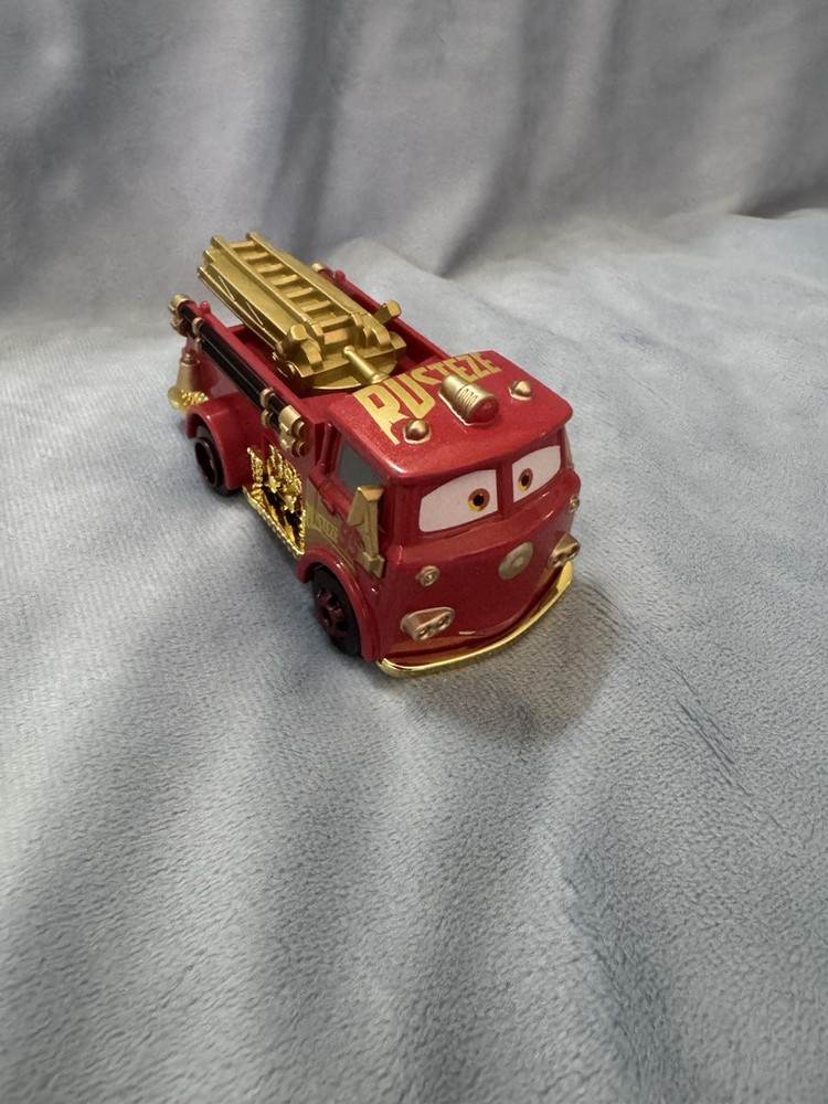 RARE Disney Pixar Cars FACTORY CUSTOM Metallic Gold Red Fire Engine Rusteze Team