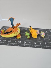 Lot of 4 Pokémon Figures Charizard Grookey Pikachu w/ Rotom Pokédex Togepi…