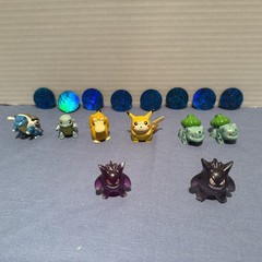 1999 POKÉMON FIGURES AND COINS SET WITH TWO-“RARE” PURPLE AND TRANSLUCENT FIGS
