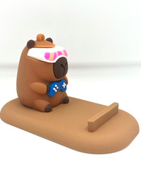 Capybara Phone Stand Flexible Plastic PVC w/ Capybara Figure Playing Video Games