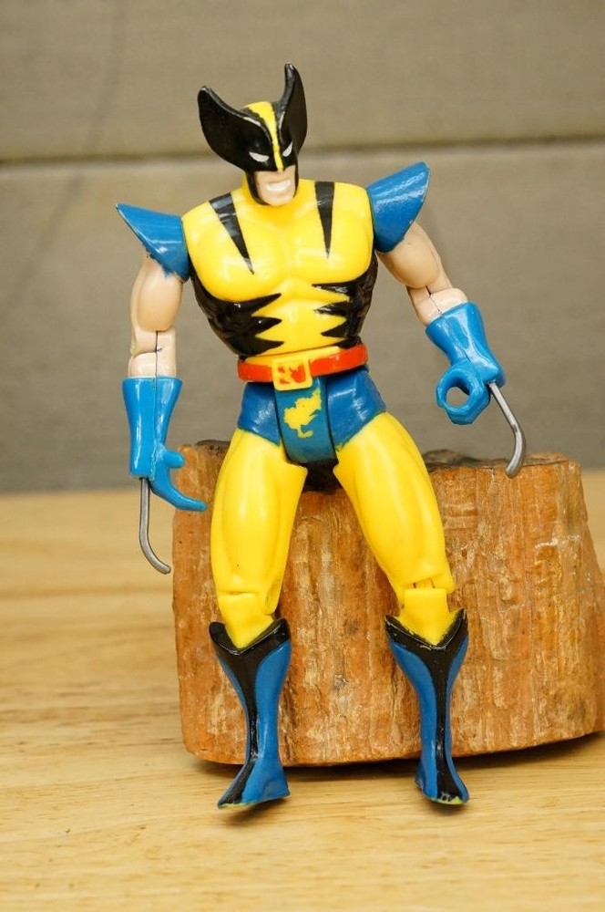 Vintage Action Figure Uncanny X-Men Wolverine Tiger Stripe ToyBiz Marvel Comic