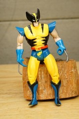 Vintage Action Figure Uncanny X-Men Wolverine Tiger Stripe ToyBiz Marvel Comic