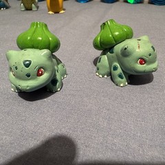 1999 POKÉMON FIGURES AND COINS SET WITH TWO-“RARE” PURPLE AND TRANSLUCENT FIGS