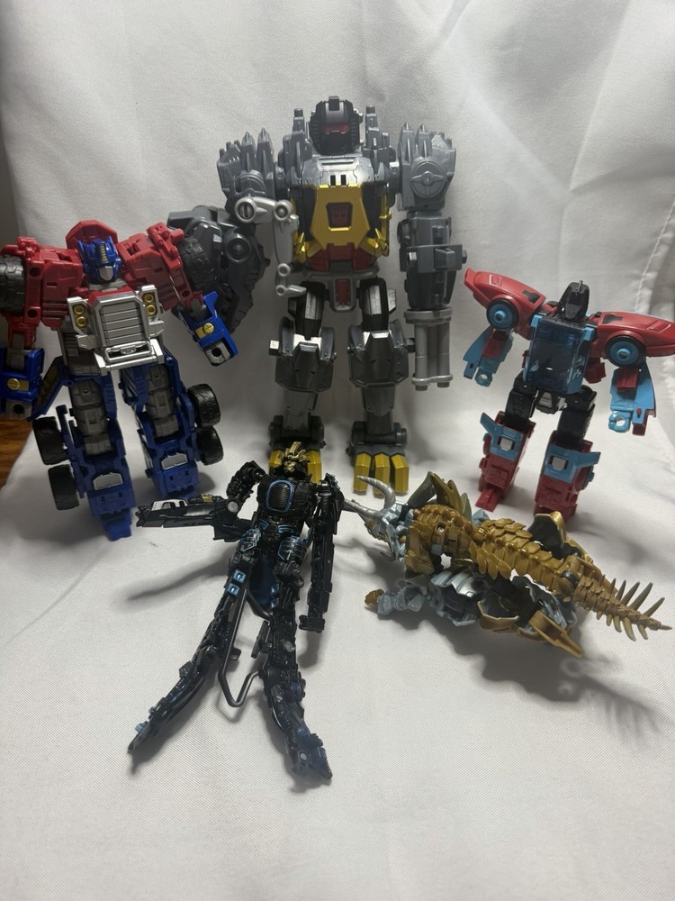 Lot of Five Transformers Action Figures Sold As-Is Everything Pictured As Shown