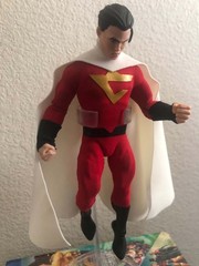 Superhero Action Figure Red White Gold Chest Emblem Cape Plastic Fabric