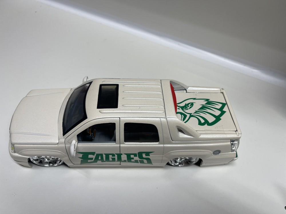 1:24 SCALE JADA DIE-CAST WITH  EAGLES CADILLAC EXT NIB