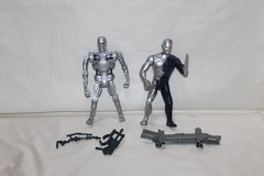 1991 T2 Terminator 2 T-800 Endoskeleton Techno Punch Action Figure and T-1000