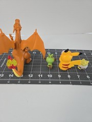 Lot of 4 Pokémon Figures Charizard Grookey Pikachu w/ Rotom Pokédex Togepi…