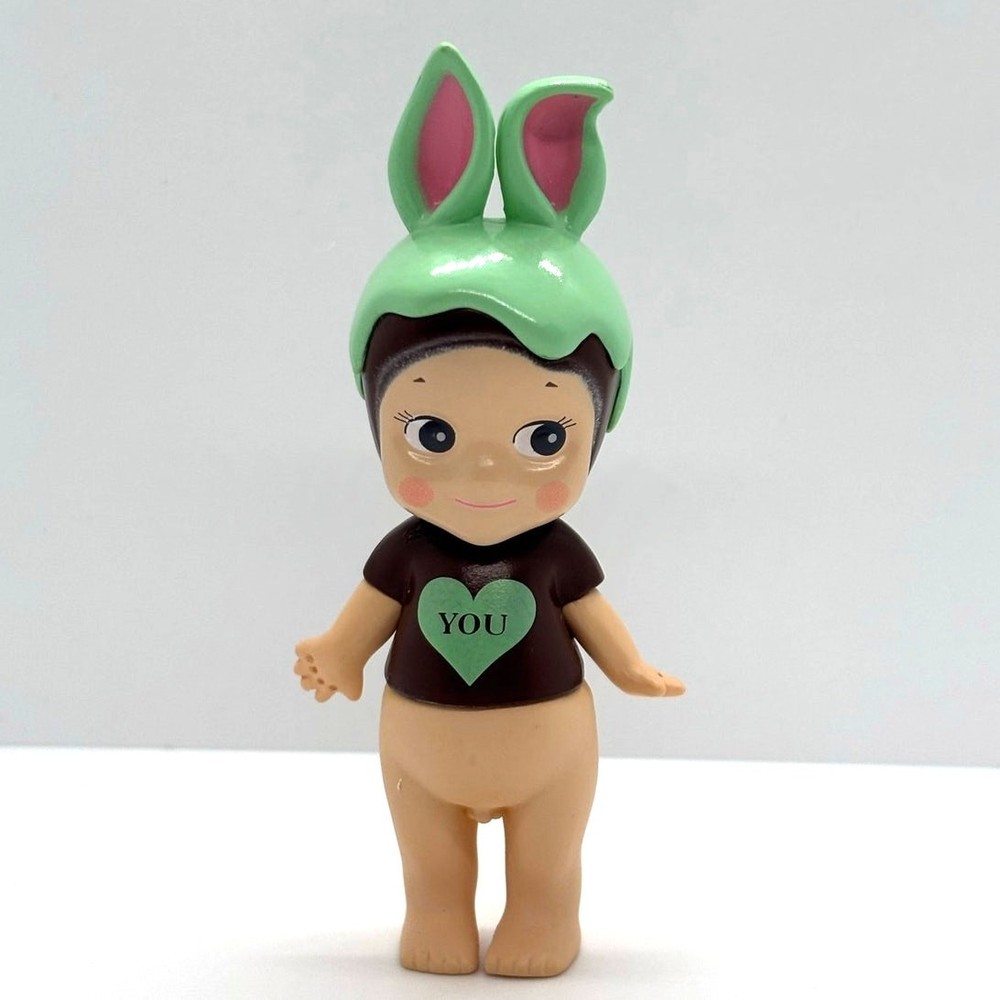 New Kewpie/Angel Collectible Mini Figure Chocolate Rabbit “You” Shirt, Open Box