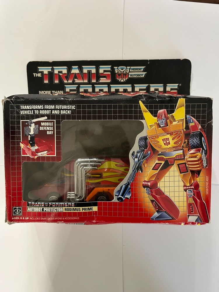 Vintage G1 Rodimus Prime Transformers w/ Box, Trailer & Blaster (1986)