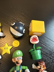 Super Mario Jakks World of Nintendo Figures Lot Yoshi Toad Luigi Bomb Fish Star