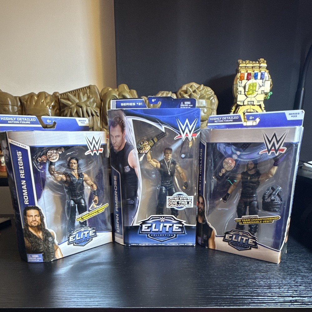 The SHIELD WWE Elite Roman Reigns Dean Ambrose Seth Rollins with Title Belts