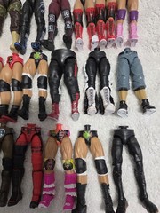 MATTEL WWE LOT OF PARTS, THIS ONE IS LOWER BODIES. LOT C