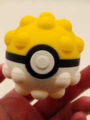 Pokemon Nintendo Knobby Silicone Yellow Pokeball Stress Ball, Fidget Ball