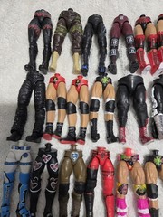 MATTEL WWE LOT OF PARTS, THIS ONE IS LOWER BODIES. LOT C
