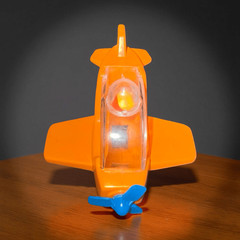 Vintage Tumble Wheels Dome Top Post Office Mail Airplane Orange Plastic A47