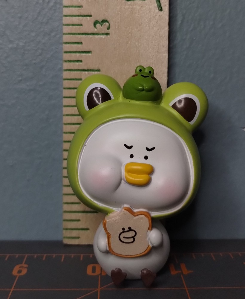 Upset Duck Toast PVC Blind Box Frog Hat 2 1/2″ Tall
