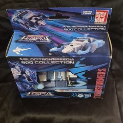 Transformers Legacy Velocitron Speedia 500 Blurr Deluxe Class IDW New In Box.