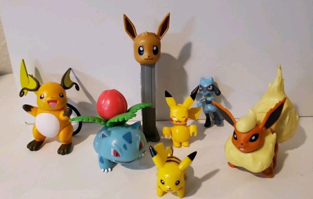 Pokémon Toys Figures Lot Of 7 Pikachu Flareon Bulbasaur Raichu Vinyl Plastic